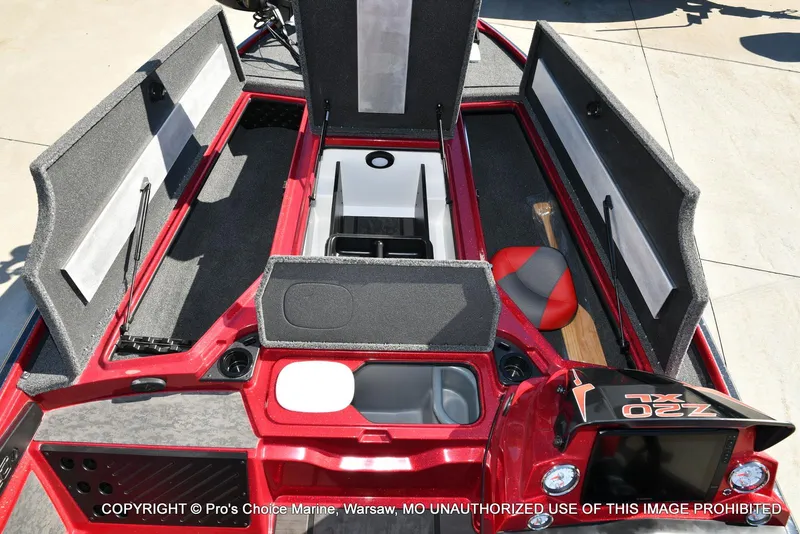 Slide: The Image of 2025 Nitro Z20 XL Pro boat interior with open storage compartments and seating. - 9