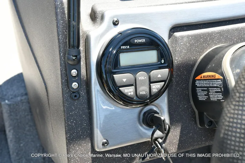 Slide: The Image of Control panel of 2023 Tracker Pro Guide V-175 Combo boat with warning label. - 11