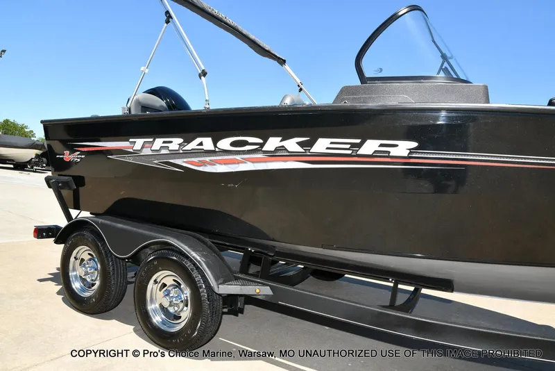 Slide: The Image of 2023 Tracker Pro Guide V-175 Combo boat on trailer, side view. - 16