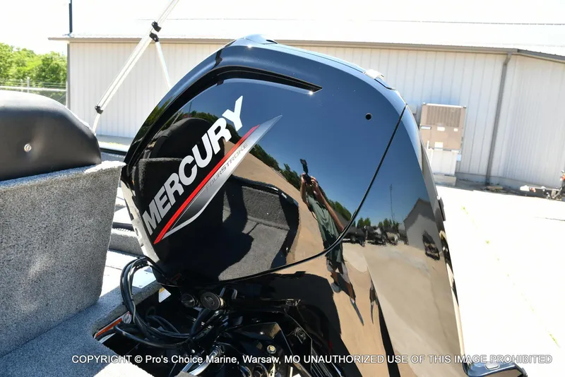 Slide: The Image of 2023 Tracker Pro Guide V-175 Combo with Mercury outboard engine, outdoor setting. - 24