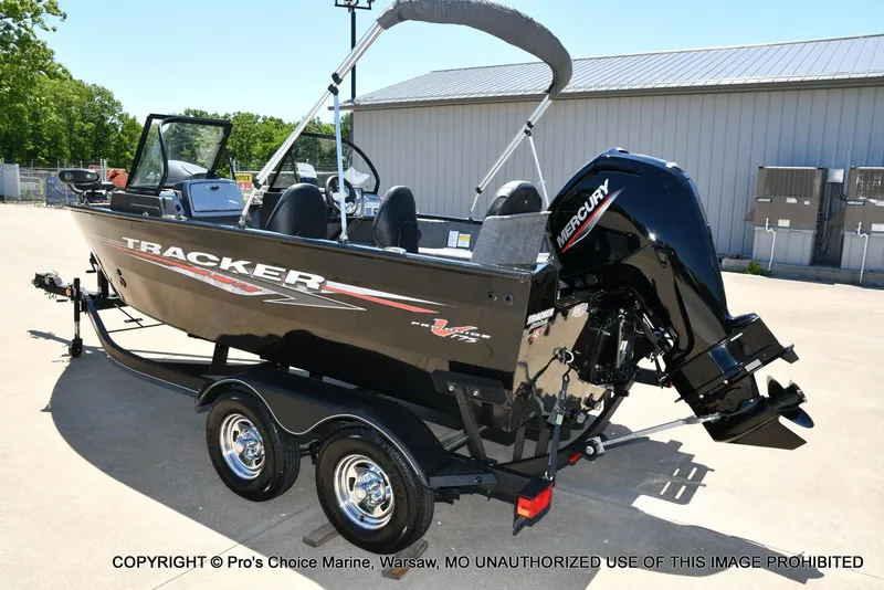 Slide: The Image of 2023 Tracker Pro Guide V-175 Combo boat with Mercury engine on trailer. - 26