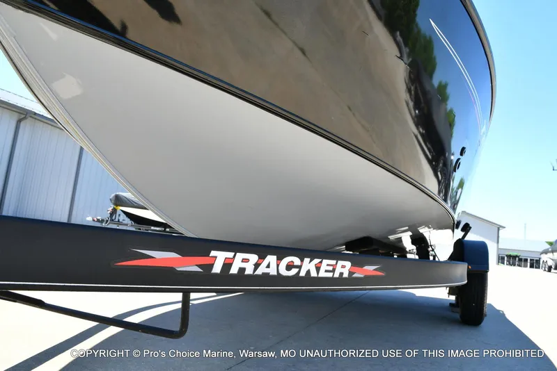 Slide: The Image of 2023 Tracker Pro Guide V-175 Combo boat on trailer, close-up view. - 32