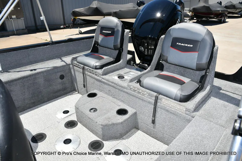 Slide: The Image of 2023 Tracker Pro Guide V-175 Combo boat interior with two seats and motor. - 37