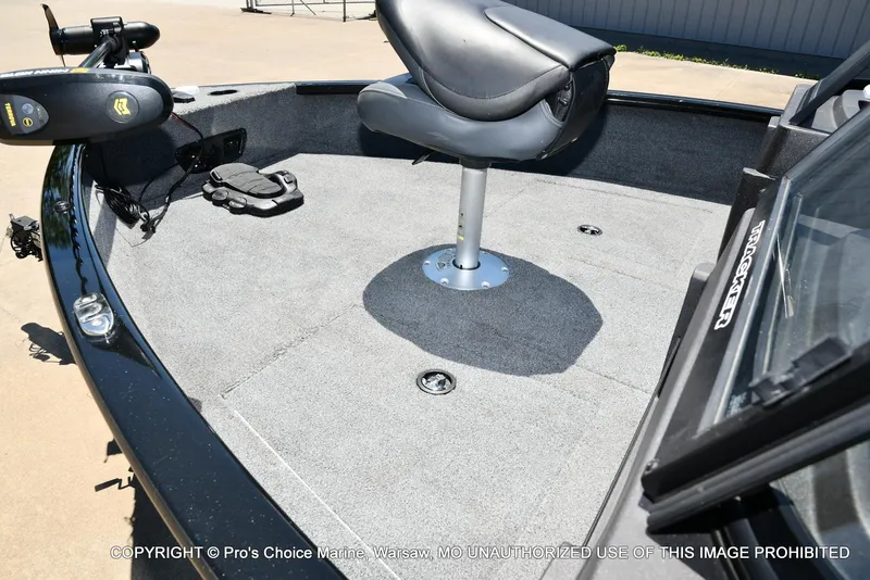 Slide: The Image of 2023 Tracker Pro Guide V-175 Combo boat interior with seating and control panel. - 38