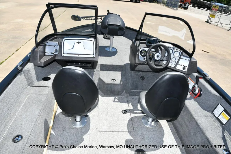 Slide: The Image of 2023 Tracker Pro Guide V-175 Combo boat interior with dual seats and control panel. - 39
