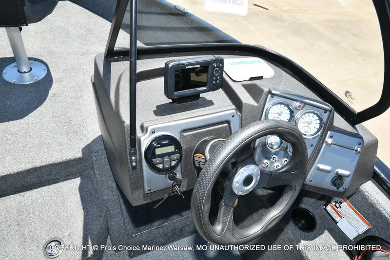 Slide: The Image of 2023 Tracker Pro Guide V-175 Combo boat dashboard with steering wheel and gauges. - 41