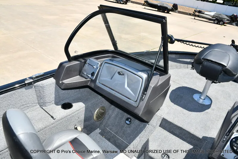 Slide: The Image of 2023 Tracker Pro Guide V-175 Combo boat interior with seating and dashboard. - 44