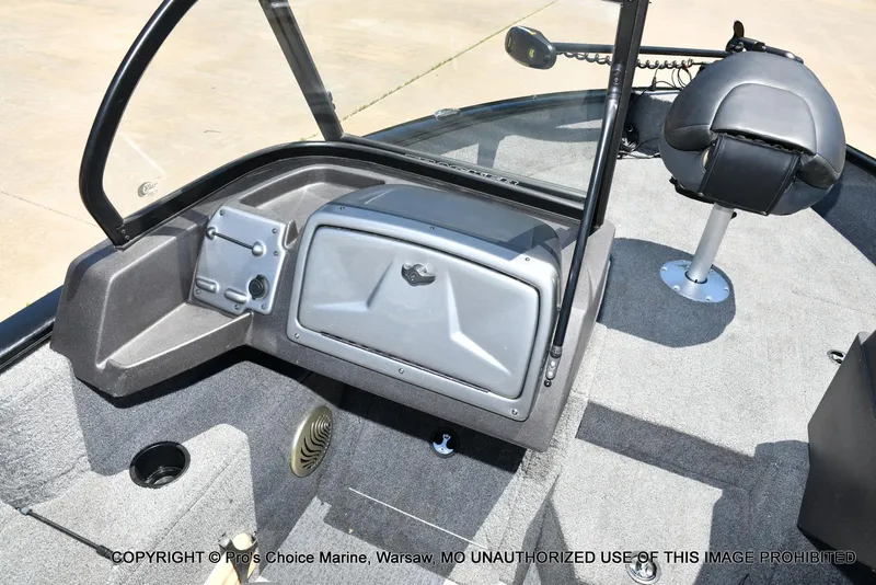 Slide: The Image of 2023 Tracker Pro Guide V-175 Combo boat interior with seating and storage compartments. - 45