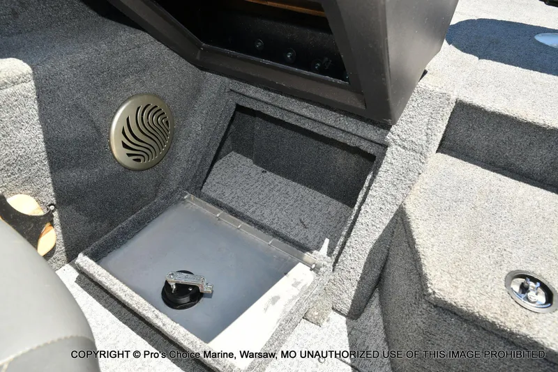 Slide: The Image of 2023 Tracker Pro Guide V-175 Combo boat interior storage compartment with carpeted finish. - 48