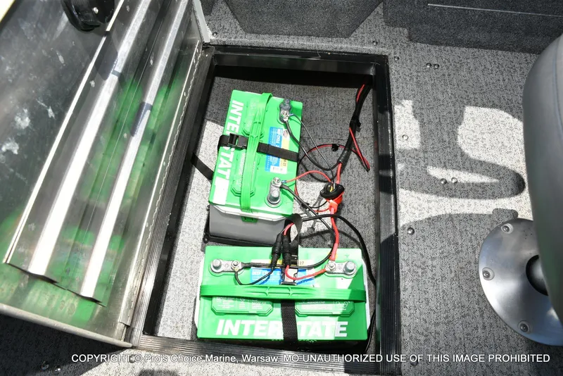 Slide: The Image of Battery compartment of 2023 Tracker Pro Guide V-175 Combo boat, featuring Interstate batteries. - 49