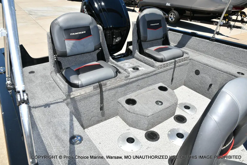 Slide: The Image of 2023 Tracker Pro Guide V-175 Combo boat interior with seating and storage compartments. - 7