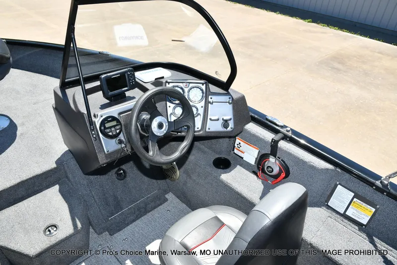 Slide: The Image of 2023 Tracker Pro Guide V-175 Combo boat dashboard with steering wheel and controls. - 9