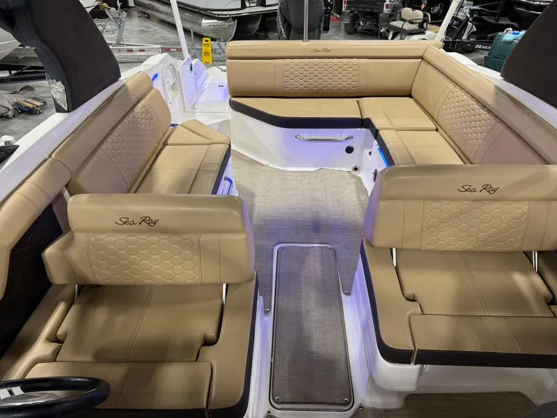 Slide: The Image of 2018 Sea Ray 270 SDX boat interior with tan leather seating and modern design. - 12