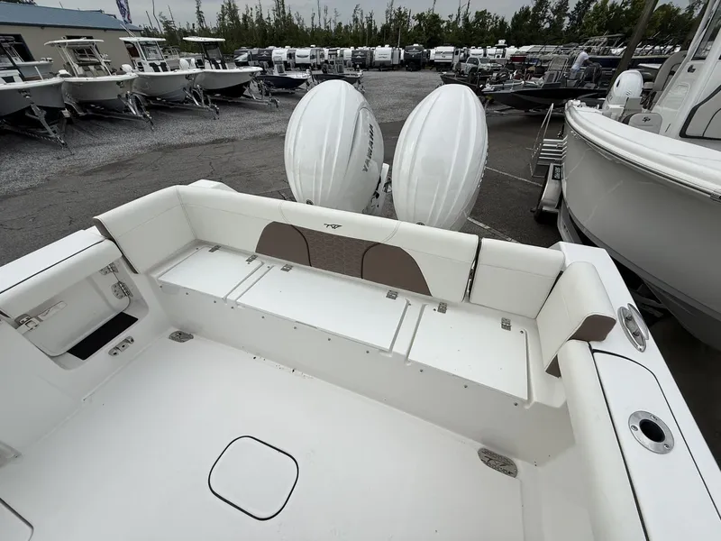 Slide: The Image of 2025 Tidewater 272 LXF boat with Seakeeper, featuring spacious seating and dual engines. - 15