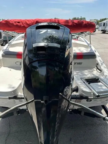 Slide: The Image of 2022 Tracker T16 boat with Mercury 75 engine, docked outdoors. - 6