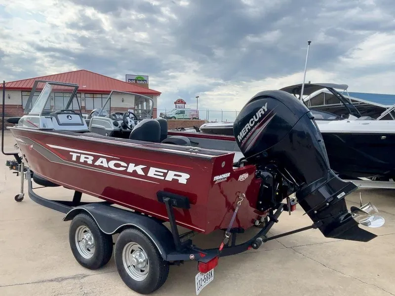 Slide: The Image of 2018 Tracker Targa™ V-18 WT boat with Mercury engine on trailer. - 2