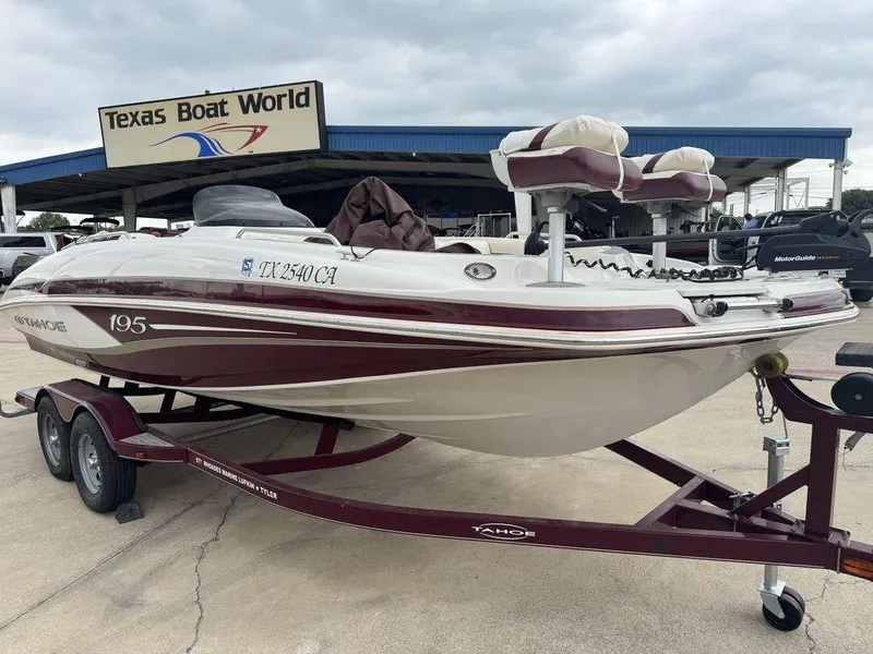 Slide: The Image of 2013 Tahoe 195 boat on trailer at Texas Boat World dealership. - 1