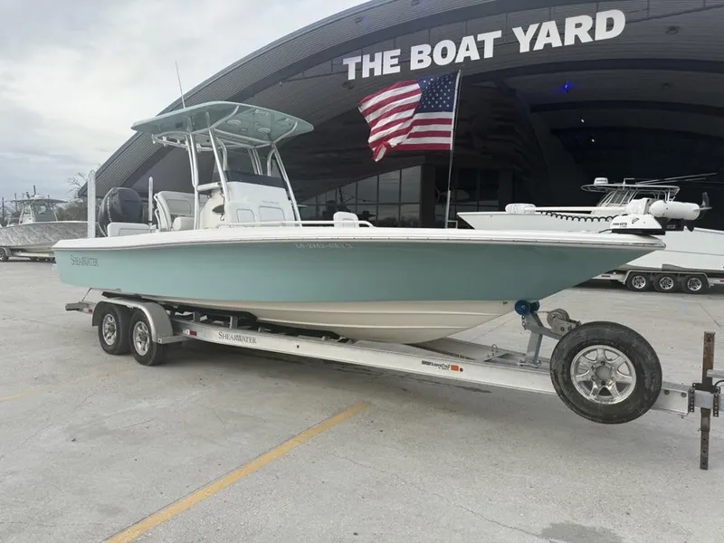Slide: The Image of 2017 ShearWater 270 Carolina Flare boat on trailer at The Boat Yard. - 1