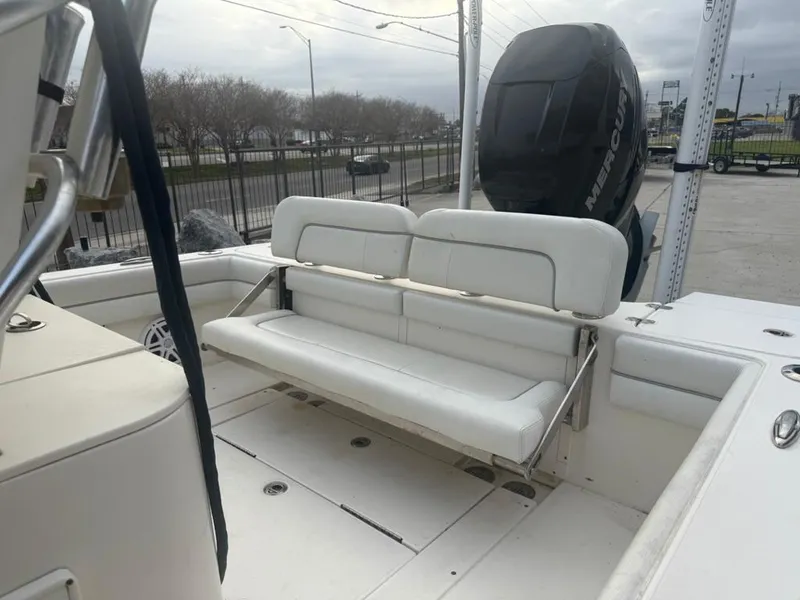 Slide: The Image of 2017 ShearWater 270 Carolina Flare boat with white seating and Mercury engine. - 13