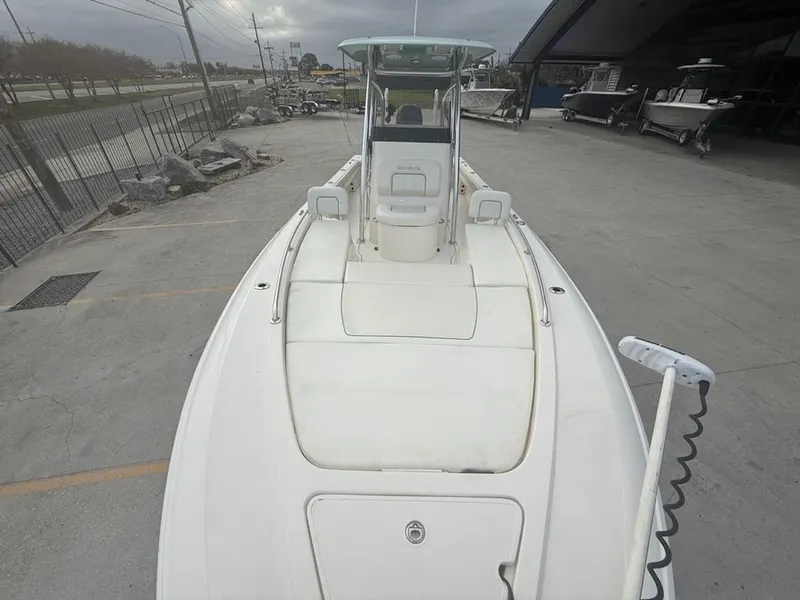 Slide: The Image of 2017 ShearWater 270 Carolina Flare boat on display at a marina. - 14