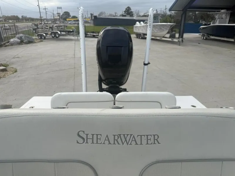 Slide: The Image of 2017 ShearWater 270 Carolina Flare boat with motor, parked in a lot. - 16