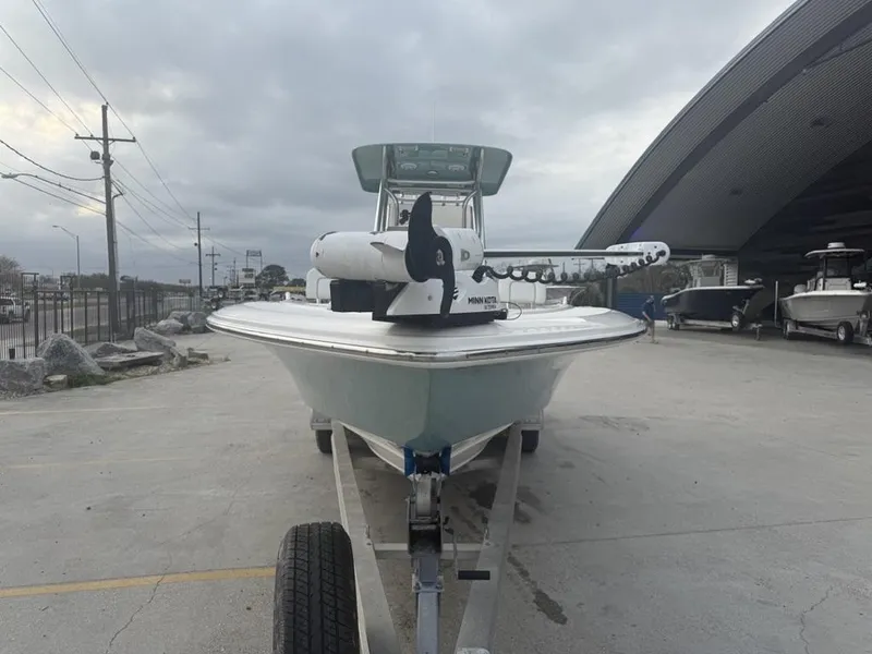 Slide: The Image of 2017 ShearWater 270 Carolina Flare boat on trailer, parked outdoors under cloudy sky. - 5