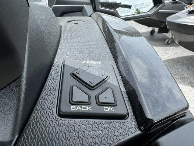 Slide: The Image of 2024 Yamaha WaveRunner VX Deluxe dashboard with control buttons and textured surface. - 11