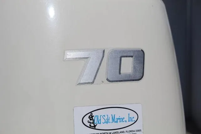 Slide: The Image of Close-up of Misty Harbor Adventure CF A-1885CF boat, featuring '70' and Old Salt Marine sticker. - 10