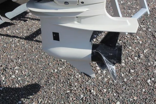 Slide: The Image of 2019 Misty Harbor Adventure CF A-1885CF boat motor propeller on gravel surface. - 12