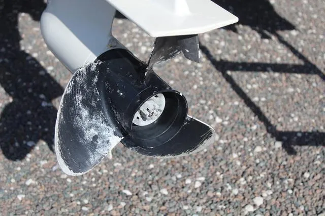 Slide: The Image of Propeller of 2019 Misty Harbor Adventure CF A-1885CF boat on gravel surface. - 13