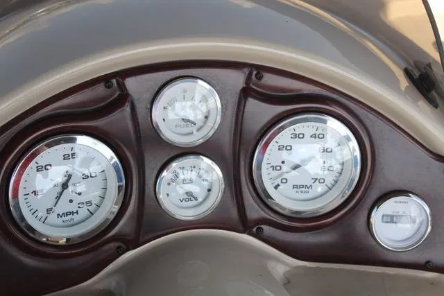 Slide: The Image of Dashboard of 2019 Misty Harbor Adventure CF A-1885CF boat with gauges for speed, fuel, and RPM. - 22