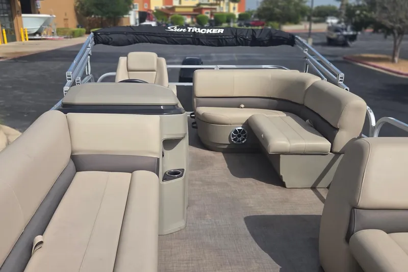 Slide: The Image of 2025 Sun Tracker Party Barge 18 DLX with spacious seating and modern design. - 4
