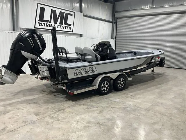 Slide: The Image of 2016 Haynie 25 Magnum boat on trailer in LMC Marine Center showroom. - 5