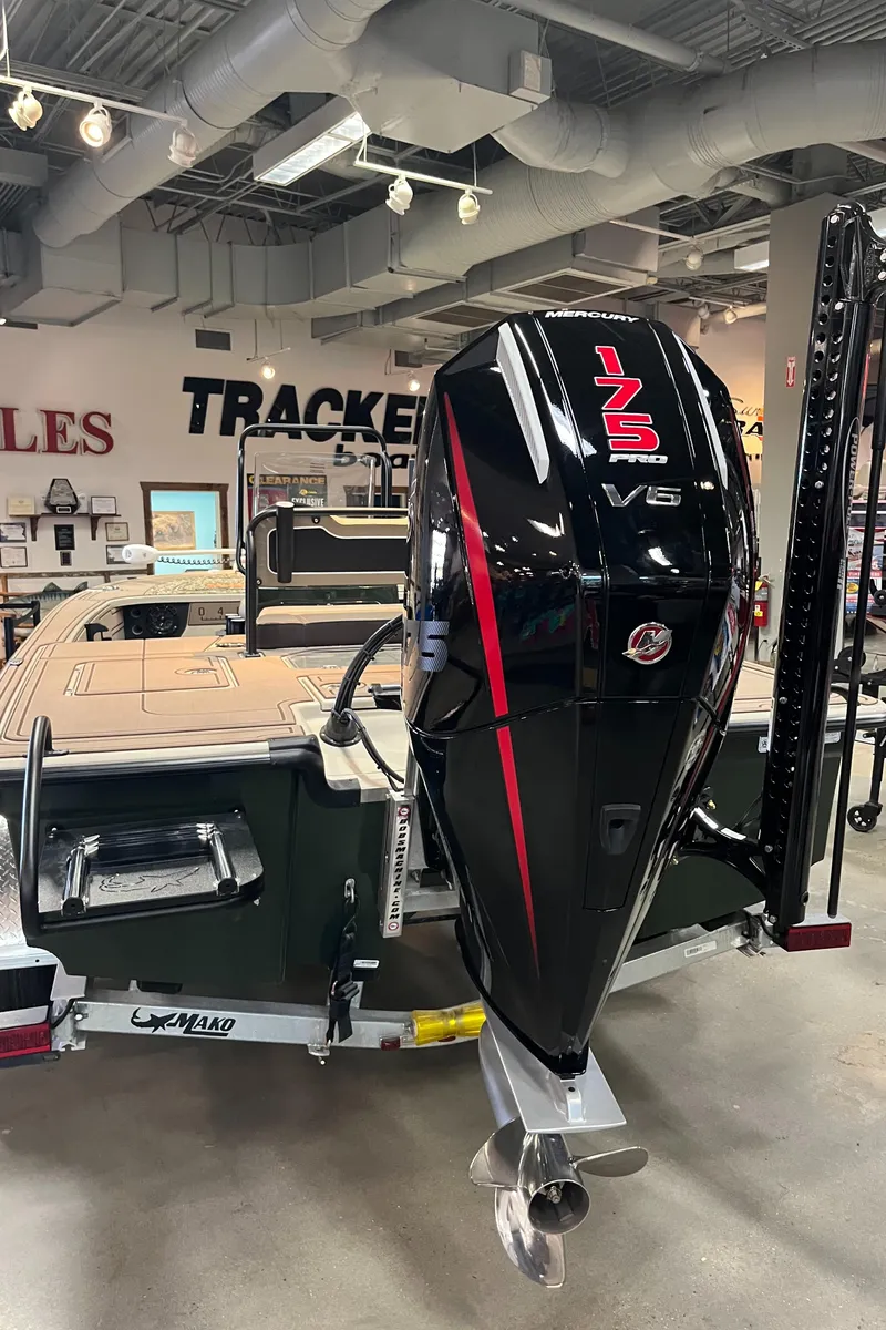 Slide: The Image of 2025 Mako 18 Pro Skiff Backwater Edition with 175 V5 engine in showroom. - 5