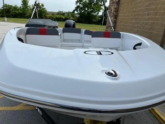 Slide: The Image of 2025 Tahoe T16 boat with sleek white design and comfortable seating. - 7