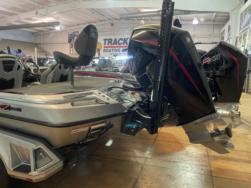 Slide: The Image of 2025 Ranger Z521R Cup-Equipped boat displayed in showroom with powerful outboard motor. - 3
