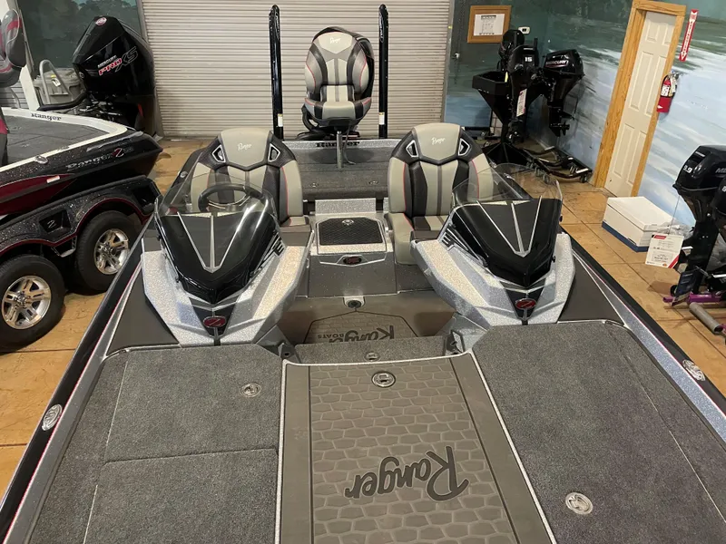 Slide: The Image of 2025 Ranger Z521R Cup-Equipped boat with dual consoles and premium seating in showroom. - 9