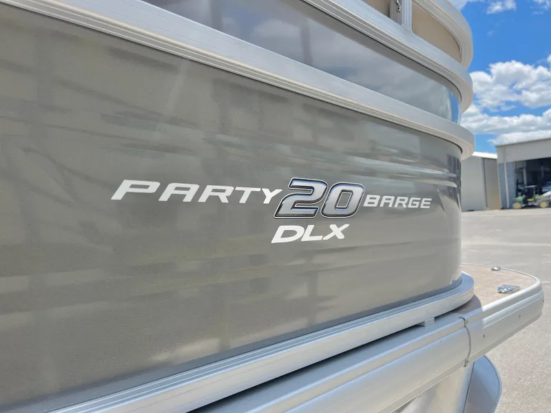 Slide: The Image of 2025 Sun Tracker Party Barge 20 DLX pontoon boat exterior detail. - 13
