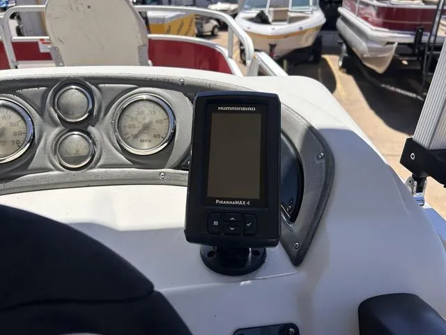 Slide: The Image of 2015 SunCatcher V20 F boat dashboard with Humminbird PiranhaMAX 4 fish finder. - 15