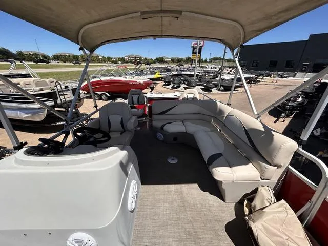 Slide: The Image of Pontoon boat interior with seating, SunCatcher V20 F, 2015 model, displayed outdoors. - 9
