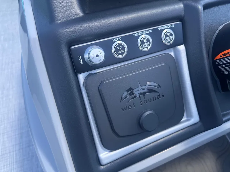 Slide: The Image of Control panel of 2025 Berkshire 23RFX STS 3.0 with Wet Sounds audio system. - 13