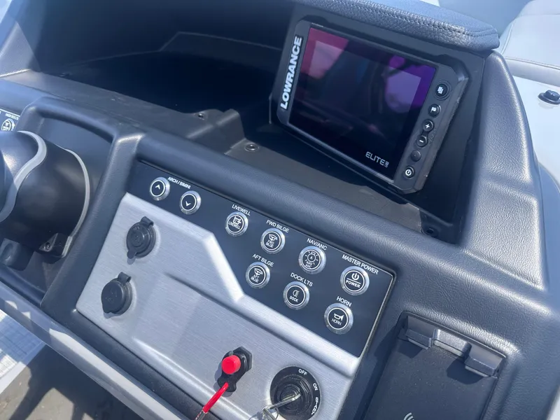 Slide: The Image of Control panel of 2025 Berkshire 23RFX STS 3.0 boat with Lowrance Elite display. - 14