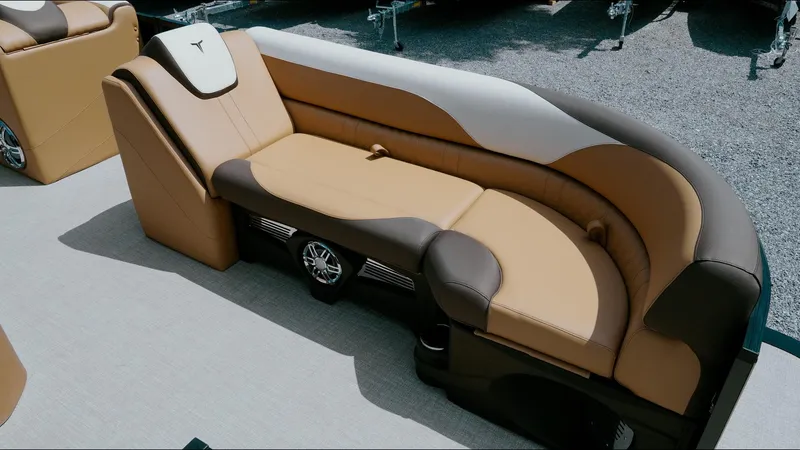 Slide: The Image of 2025 Tahoe Pontoon LTZ Cruise Rear Bench with stylish brown and beige seating. - 14