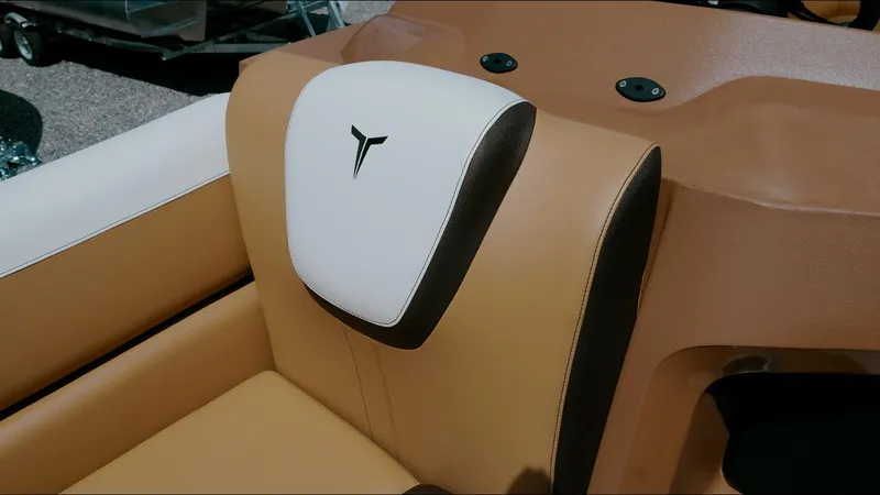 Slide: The Image of 2025 Tahoe Pontoon LTZ Cruise Rear Bench with tan and white upholstery. - 15