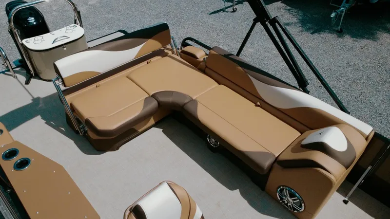 Slide: The Image of 2025 Tahoe Pontoon LTZ Cruise Rear Bench with luxurious tan seating and modern design. - 6