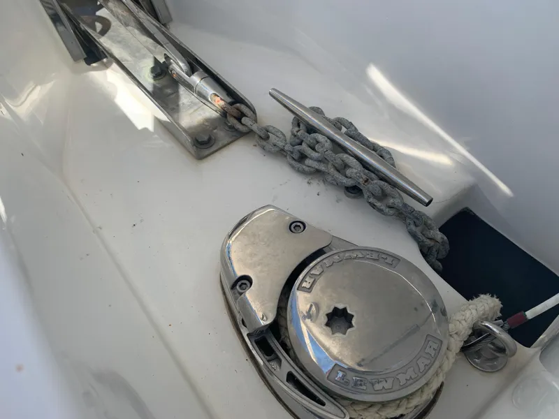 Slide: The Image of Anchor chain and winch on 2018 Sea Hunt Gamefish 27 Forward Seating boat. - 18