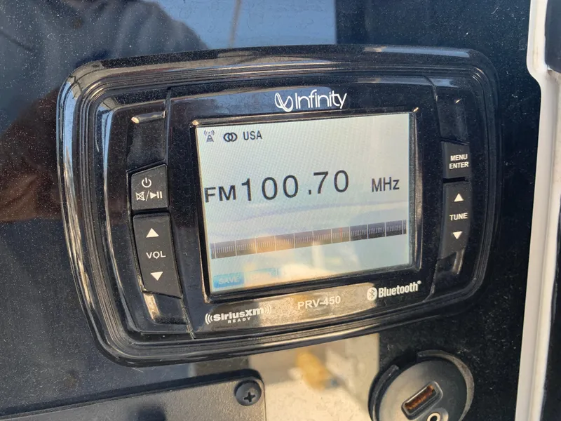 Slide: The Image of Infinity PRV-450 radio display on 2018 Sea Hunt Gamefish 27, tuned to FM 100.70 MHz. - 20