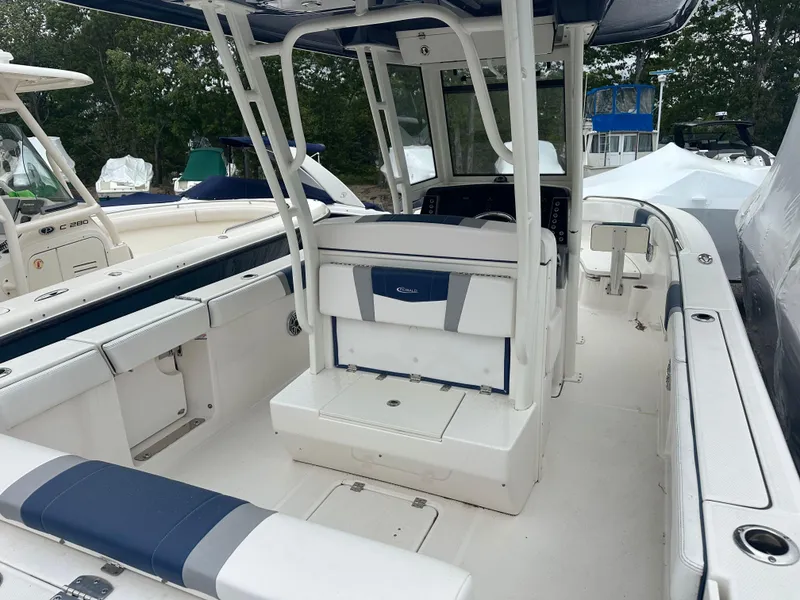 Slide: The Image of 2021 Robalo R272 Center Console boat with spacious seating and modern design. - 8