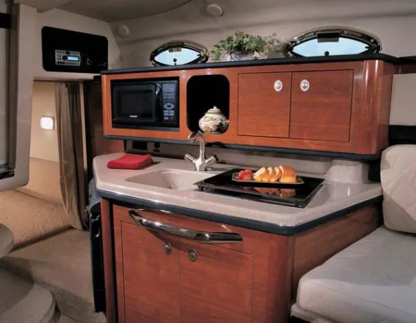 Slide: The Image of Control panel of 2007 Sea Ray 260 Sundancer with Northstar radio and switches. - 22