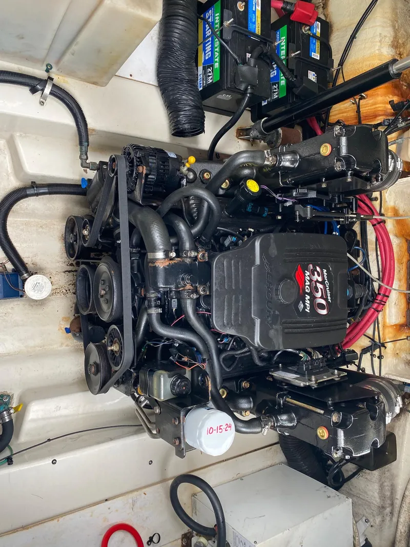 Slide: The Image of 2007 Sea Ray 260 Sundancer cabin interior with kitchenette and seating area. - 24